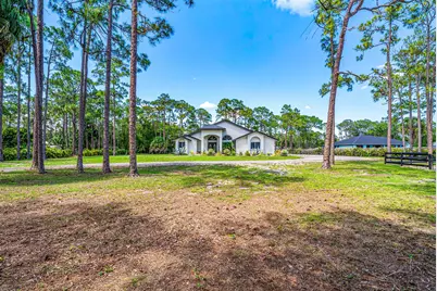 16105 Temple Boulevard, The Acreage, FL 33470 - Photo 3