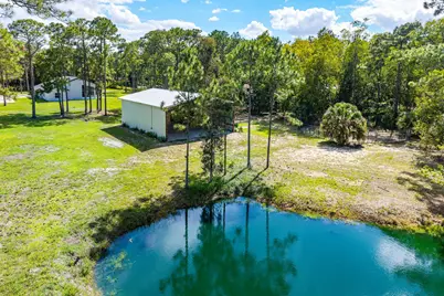 16105 Temple Boulevard, The Acreage, FL 33470 - Photo 19