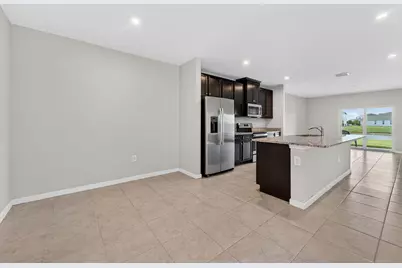 9449 SW Libertas Way, Port Saint Lucie, FL 34987 - Photo 7