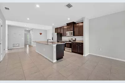 9449 SW Libertas Way, Port Saint Lucie, FL 34987 - Photo 9