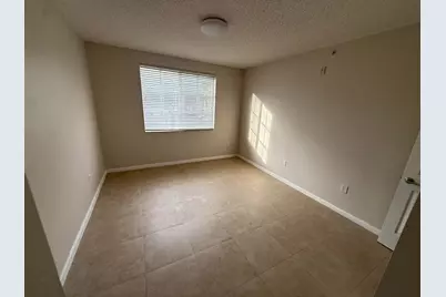 7980 N Nob Hill Road #205, Tamarac, FL 33321 - Photo 7