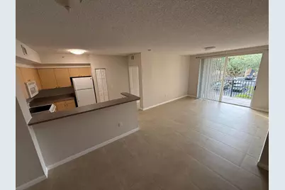 7980 N Nob Hill Road #205, Tamarac, FL 33321 - Photo 13