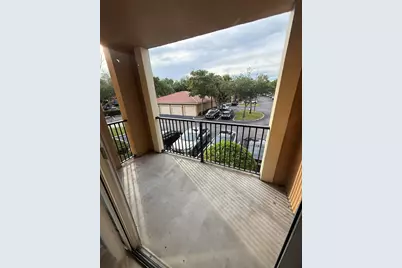 7980 N Nob Hill Road #205, Tamarac, FL 33321 - Photo 11