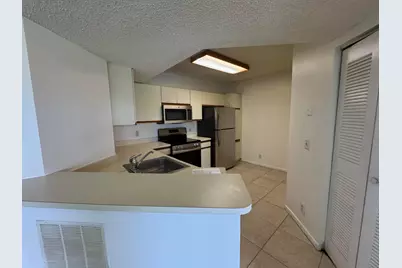 8891 Wiles Road #303, Coral Springs, FL 33067 - Photo 7