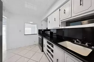 400 Golden Isles Dr, Hallandale Beach, FL 33009 - Photo 13