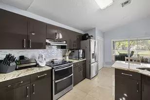 126 Hammocks Ct, Greenacres, FL 33413 - Photo 11