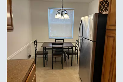 9033 Wiles Road #102, Coral Springs, FL 33067 - Photo 3