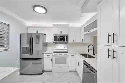 3955 N Nob Hill Road #404, Sunrise, FL 33351 - Photo 9