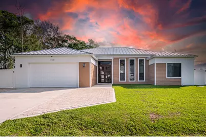 1199 SE Puritan Lane, Port Saint Lucie, FL 34983 - Photo 1