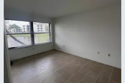 208 Lake Pointe Drive #108, Oakland Park, FL 33309 - Photo 11