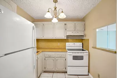 9460 Sunrise Lakes Boulevard #106, Sunrise, FL 33322 - Photo 3