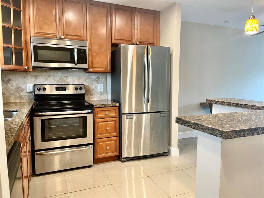 809 W Oakland Park Blvd #J12 - 809 W Oakland Park Blvd #J12, Oakland Park, FL 33311 Luxury Property | Jose Angel Pina