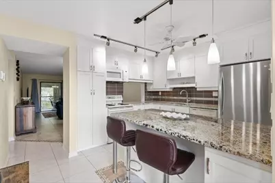 6095 N Sabal Palm Boulevard #210, Tamarac, FL 33319 - Photo 1