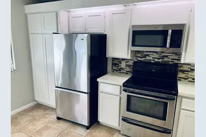 2441 Village Boulevard #102, West Palm Beach, FL 33409 - Photo 3