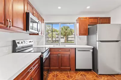 9091 Lime Bay Boulevard #210, Tamarac, FL 33321 - Photo 1