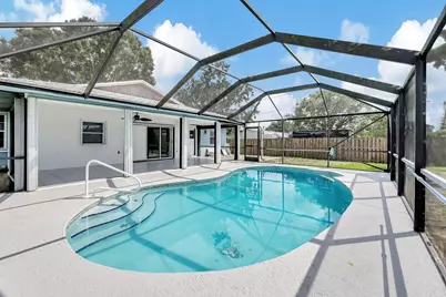 1124 SE Ladner Street, Port Saint Lucie, FL 34983 - Photo 1