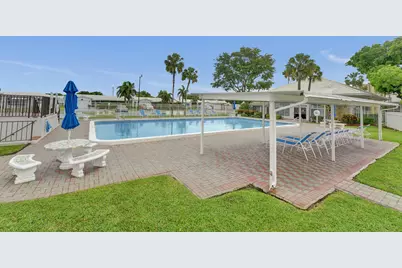 2551 W Golf Boulevard #108, Pompano Beach, FL 33064 - Photo 23