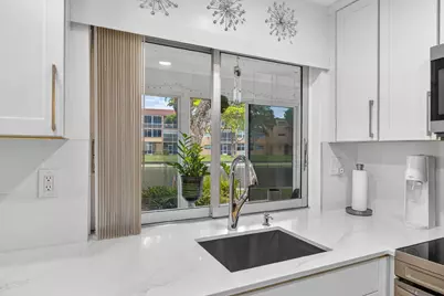 9081 Lime Bay Boulevard #115, Tamarac, FL 33321 - Photo 7