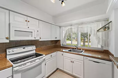5570 Tamberlane Circle #131, Palm Beach Gardens, FL 33418 - Photo 13