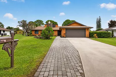 5589 SE Paramount Drive, Stuart, FL 34997 - Photo 1