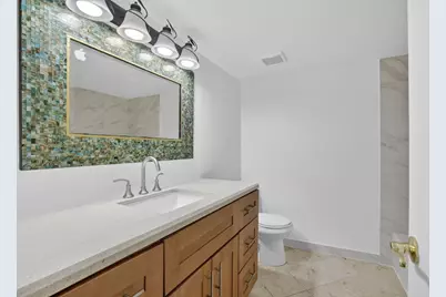 3041 N Oakland Forest Drive #103, Oakland Park, FL 33309 - Photo 9