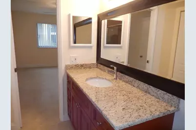 3017 N Oakland Forest Drive #106, Oakland Park, FL 33309 - Photo 13