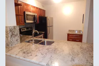 3017 N Oakland Forest Drive #106, Oakland Park, FL 33309 - Photo 5