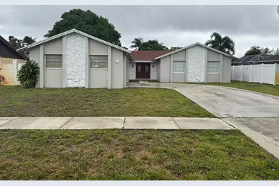 589 Cashiers Drive, West Palm Beach, FL 33413 - Photo 1