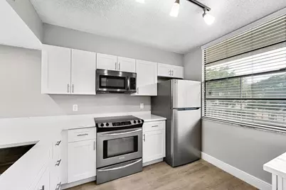 3636 Whitehall Drive #402, West Palm Beach, FL 33401 - Photo 1