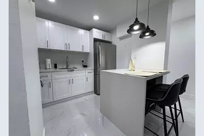 4265 NW South Tamiami Canal Drive #1-211, Miami, FL 33126 - Photo 1