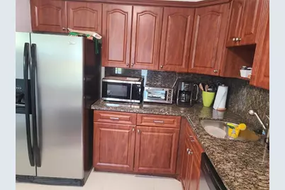 3091 N Course Drive #208, Pompano Beach, FL 33069 - Photo 1
