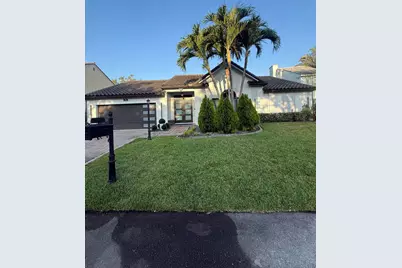 7670 Live Oak Drive, Coral Springs, FL 33065 - Photo 1