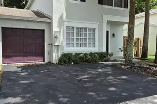5920 S Golden Beauty Ln, Tamarac, FL 33321 - Photo 1