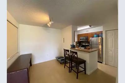2841 N Oakland Forest Drive #107, Oakland Park, FL 33309 - Photo 3