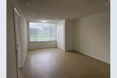 2841 N Oakland Forest Drive #107, Oakland Park, FL 33309 - Photo 9