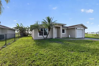 138 Dabou Loop, Belle Glade, FL 33430 - Photo 3