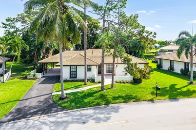 433 Pine Villa Drive, Atlantis, FL 33462 - Photo 1