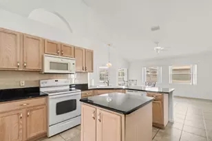 5829 NW Gerald Cir, Port Saint Lucie, FL 34986 - Photo 13