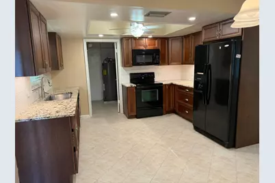 9129 W Highland Pines Boulevard, Palm Beach Gardens, FL 33418 - Photo 17