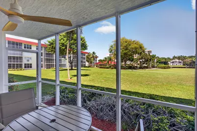 3150 NE 48th Court #104, Lighthouse Point, FL 33064 - Photo 1