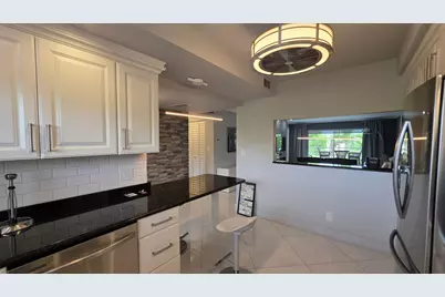 9301 Sunrise Lakes Boulevard #306, Sunrise, FL 33322 - Photo 5