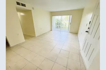 1101 N Benoist Farms Road #106, West Palm Beach, FL 33411 - Photo 1