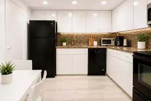 401 Golden Isles Dr, Hallandale Beach, FL 33009 - Photo 1