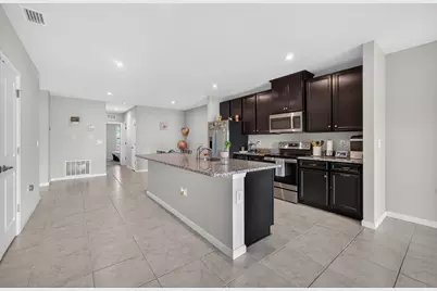 9449 SW Libertas Way, Port Saint Lucie, FL 34987 - Photo 17