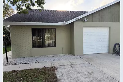 9085 W Highland Pines Drive, Palm Beach Gardens, FL 33418 - Photo 1
