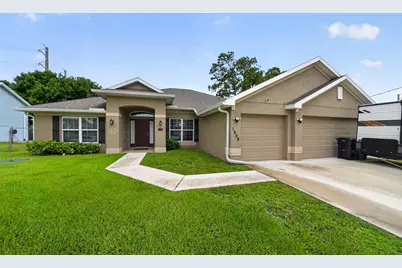 1858 SW Mackenzie Street, Port Saint Lucie, FL 34953 - Photo 1