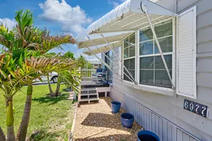 6977 SE Delegate St, Hobe Sound, FL 33455 - Photo 7