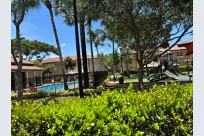 6898 Julia Gardens Drive, Coconut Creek, FL 33073 - Photo 29