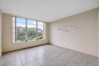 3900 Oaks Clubhouse Drive #411, Pompano Beach, FL 33069 - Photo 11