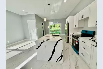 660 NE Moss Rose Place, Port Saint Lucie, FL 34983 - Photo 9